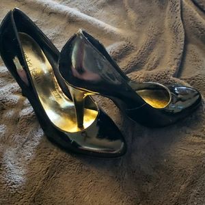 Classic black patent leather pumps